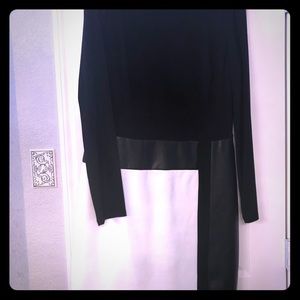 Classic white and black dress with leather trim.